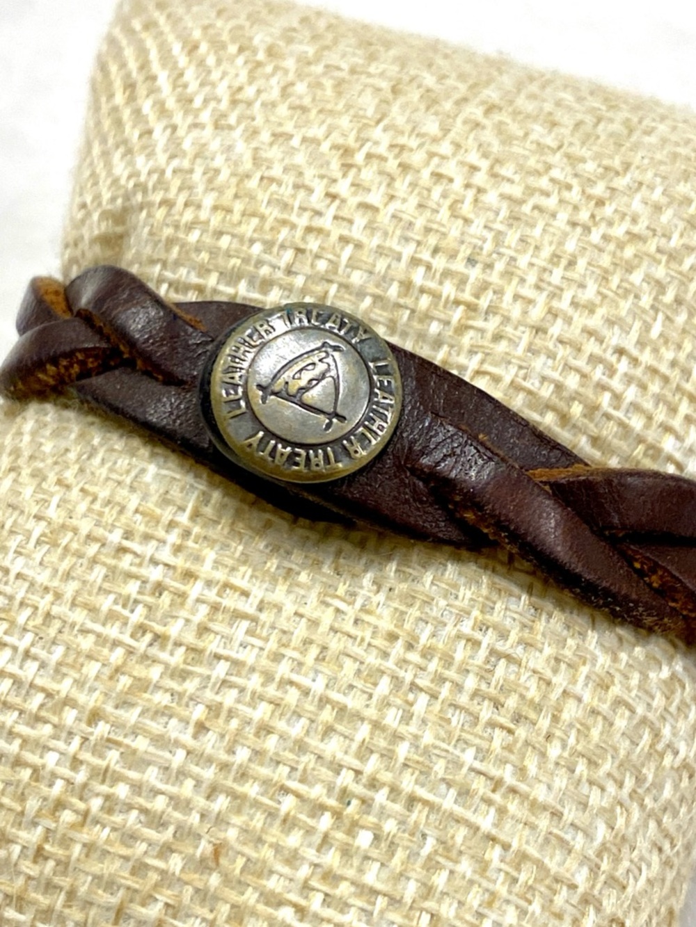 Hand-Braided Dark Brown Leather Bracelet with Metal Emblem